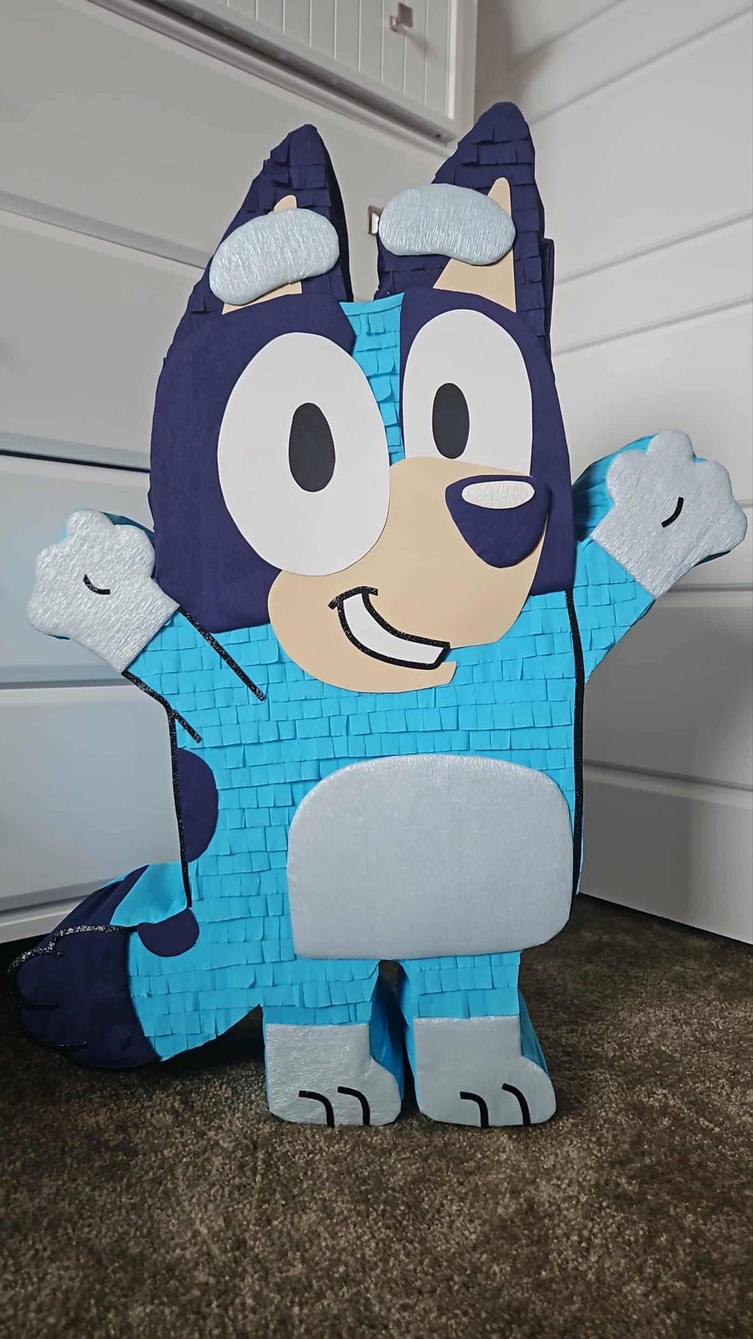 Bluey character piñata standing tall