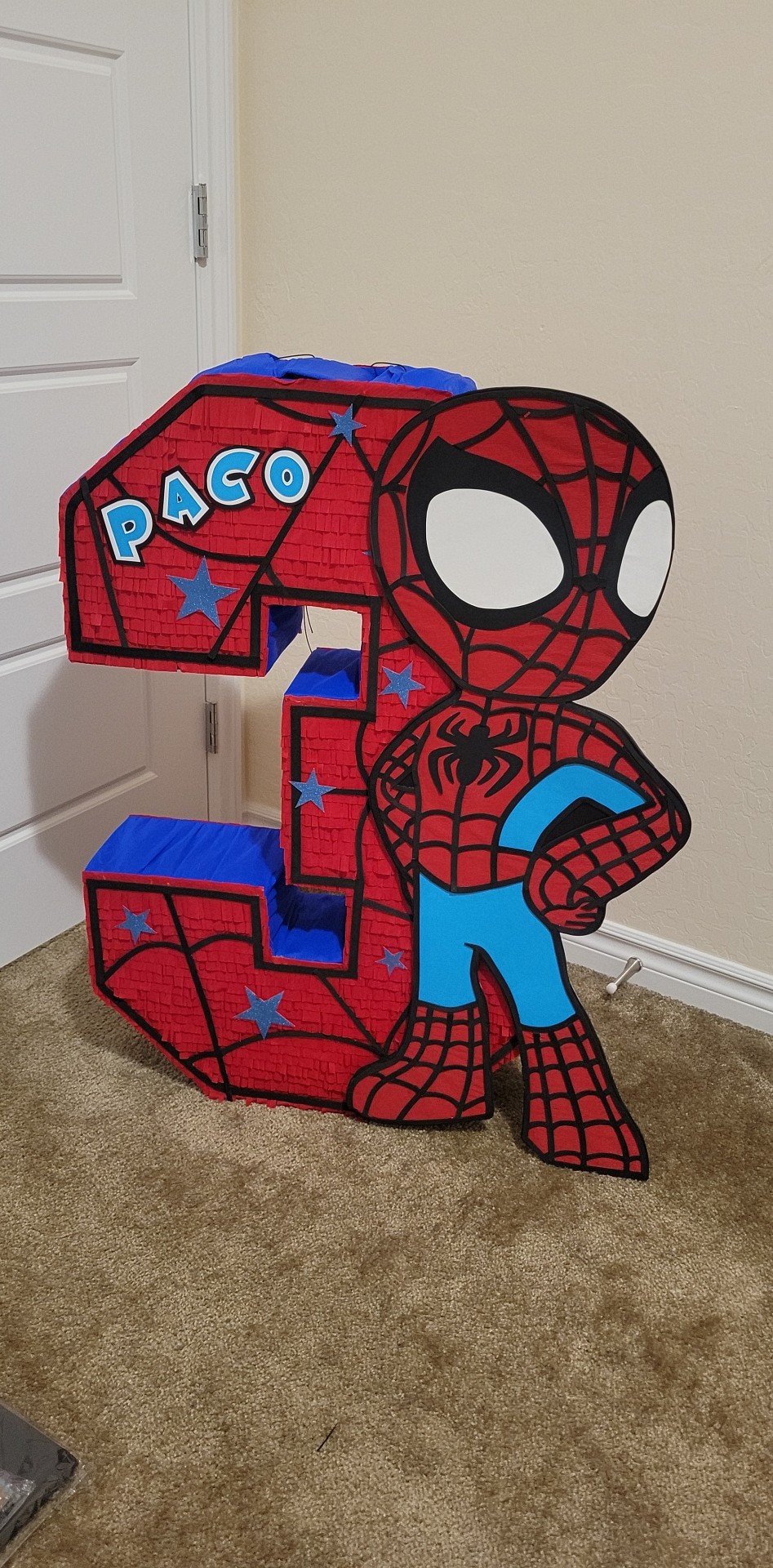 Spider-Man number 1 piñata with the name Paco